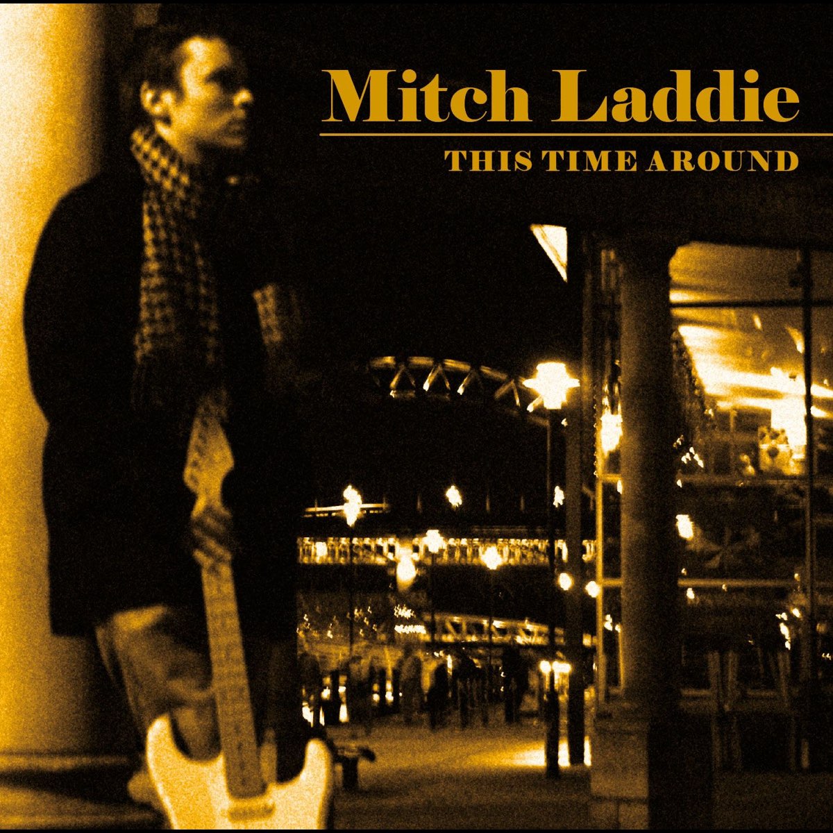 This time. Mitch Laddie this time around 2010. Mitch Laddie Burning Bridges 2012. Mitch Laddie Live in Concert 2014. Our Blues.