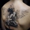 A gallery app showing Angel Wing Tattoos