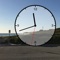 This application allows you to overlay an analog clock onto a picture that may be selected from the pictures held on the iPhone